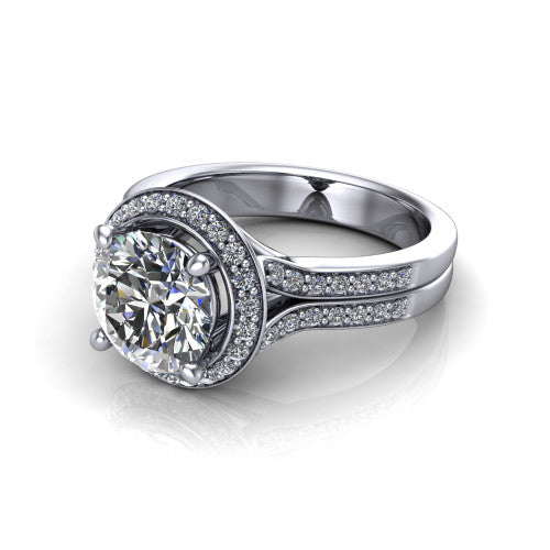 Serena round halo engagement ring in 18K White Gold, three-quarter perspective showing the round center in a cushion-shaped pav&eacute; halo above a split shank