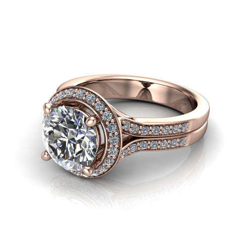 Serena round halo engagement ring in 18K Rose Gold, three-quarter perspective showing the round center in a cushion-shaped pav&eacute; halo above a split shank