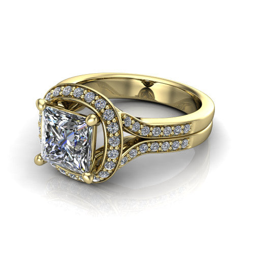 Serena princess halo engagement ring in 18K Yellow Gold, three-quarter perspective showing the princess center in a cushion-shaped pav&eacute; halo above a split shank