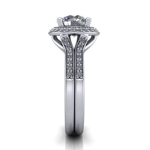 Serena round halo engagement ring in Platinum, side profile showing the pav&eacute; running down the split shoulders and the cushion halo in profile