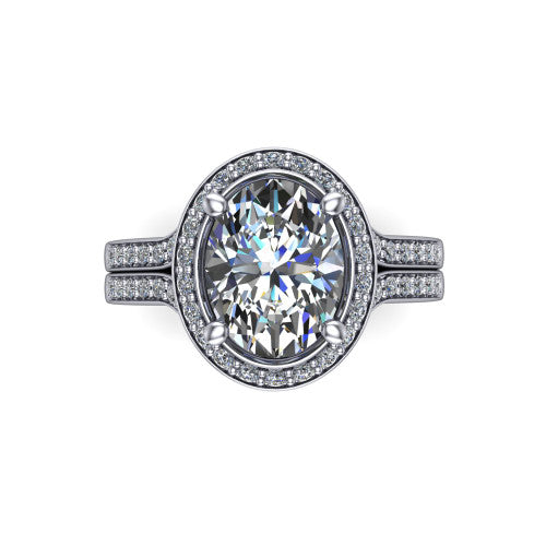 Serena oval halo engagement ring in Platinum, top-down view showing the cushion-shaped pav&eacute; halo and double-claw prongs framing the oval center