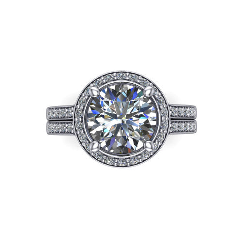 Serena round halo engagement ring in 14K White Gold, top-down view showing the cushion-shaped pav&eacute; halo and double-claw prongs framing the round center