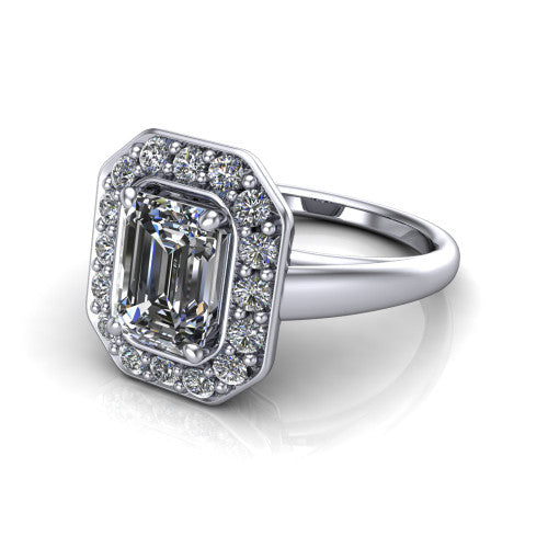 Makenna emerald halo engagement ring in Platinum, three-quarter perspective showing the emerald center in a single pav&eacute; diamond halo above a plain polished band