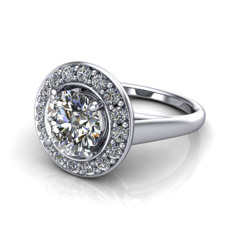 Makenna round halo engagement ring in Platinum, three-quarter perspective showing the round center in a single pav&eacute; diamond halo above a plain polished band