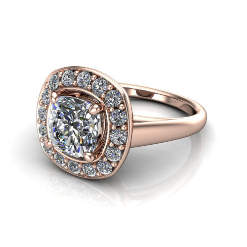 Makenna cushion halo engagement ring in 14K Rose Gold, three-quarter perspective showing the cushion center in a single pav&eacute; diamond halo above a plain polished band