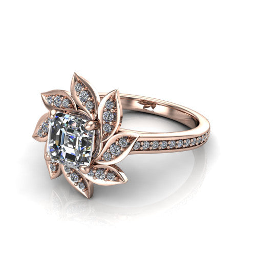 Aurelia square emerald floral halo engagement ring in 18K Rose Gold, three-quarter perspective showing the center surrounded by pav&eacute; petals radiating like a flower above a pav&eacute; band