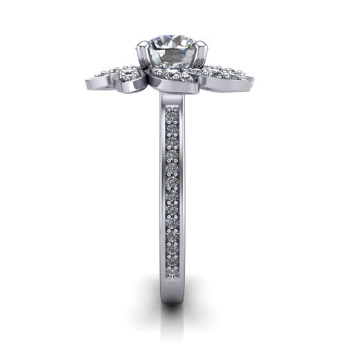 Aurelia round floral halo engagement ring in Platinum, side profile showing the pav&eacute; band and the floral halo profile