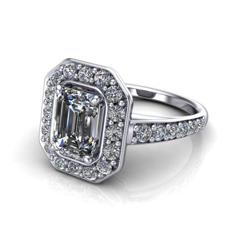 Gia emerald double halo engagement ring in Platinum, three-quarter perspective showing the center wrapped in a double pav&eacute; halo above a pav&eacute; band