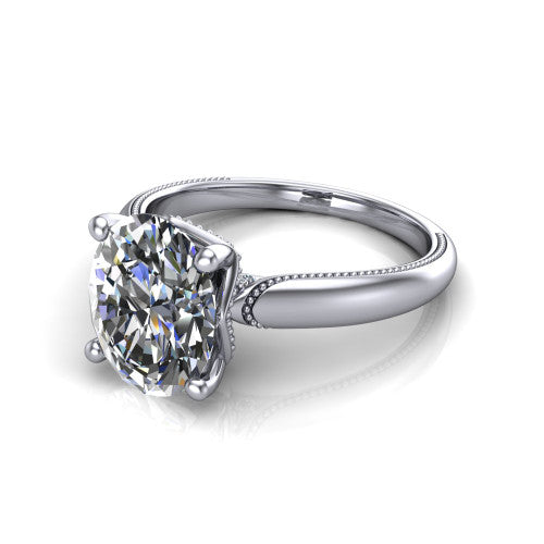 Laila oval solitaire engagement ring in 18K White Gold, three-quarter perspective showing the double-prong center raised above a milgrain-edged polished band