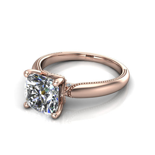 Laila cushion solitaire engagement ring in 18K Rose Gold, three-quarter perspective showing the double-prong center raised above a milgrain-edged polished band