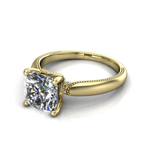 Laila cushion solitaire engagement ring in 14K Yellow Gold, three-quarter perspective showing the double-prong center raised above a milgrain-edged polished band
