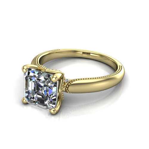 Laila square emerald solitaire engagement ring in 18K Yellow Gold, three-quarter perspective showing the double-prong center raised above a milgrain-edged polished band