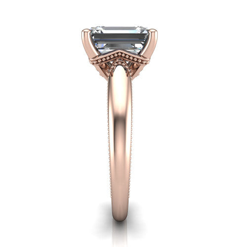 Laila emerald solitaire engagement ring in 14K Rose Gold, side profile showing the milgrain detailing running down the polished band in profile