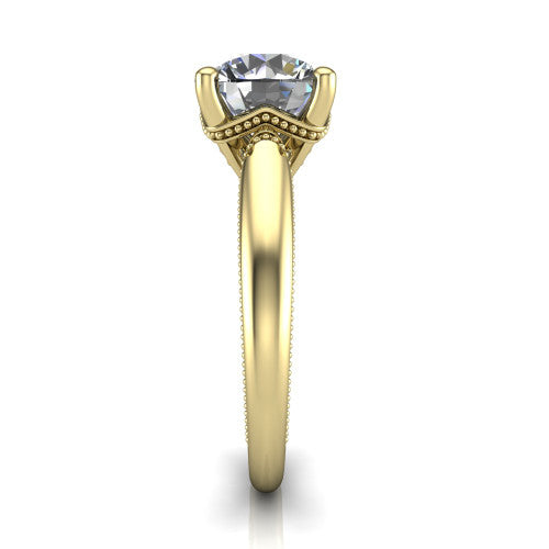 Laila round solitaire engagement ring in 18K Yellow Gold, side profile showing the milgrain detailing running down the polished band in profile