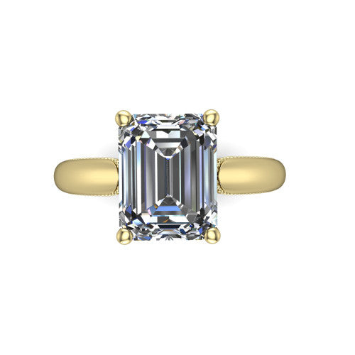 Laila emerald solitaire engagement ring in 18K Yellow Gold, top-down view showing the center stone and the slim milgrain band from above