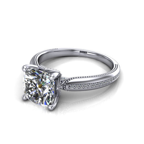 Vanessa cushion solitaire engagement ring in 14K White Gold, three-quarter perspective showing the prong-set center raised above a slim pav&eacute; milgrain band