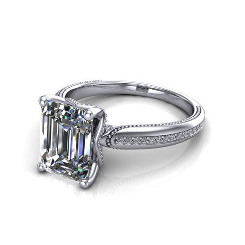 Vanessa emerald solitaire engagement ring in 14K White Gold, three-quarter perspective showing the prong-set center raised above a slim pav&eacute; milgrain band