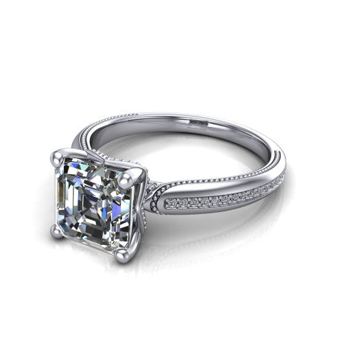 Vanessa square emerald solitaire engagement ring in 14K White Gold, three-quarter perspective showing the prong-set center raised above a slim pav&eacute; milgrain band