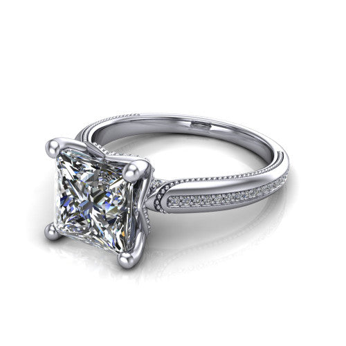 Vanessa princess solitaire engagement ring in 14K White Gold, three-quarter perspective showing the prong-set center raised above a slim pav&eacute; milgrain band