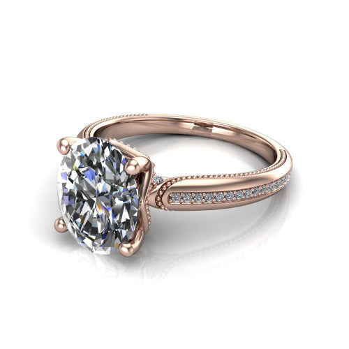 Vanessa oval solitaire engagement ring in 14K Rose Gold, three-quarter perspective showing the prong-set center raised above a slim pav&eacute; milgrain band