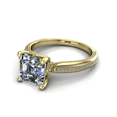 Vanessa square emerald solitaire engagement ring in 14K Yellow Gold, three-quarter perspective showing the prong-set center raised above a slim pav&eacute; milgrain band