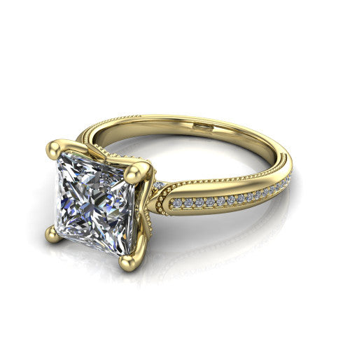 Vanessa princess solitaire engagement ring in 18K Yellow Gold, three-quarter perspective showing the prong-set center raised above a slim pav&eacute; milgrain band