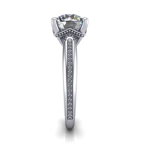 Vanessa round solitaire engagement ring in Platinum, side profile showing the pav&eacute; running down the band and the milgrain detailing in profile
