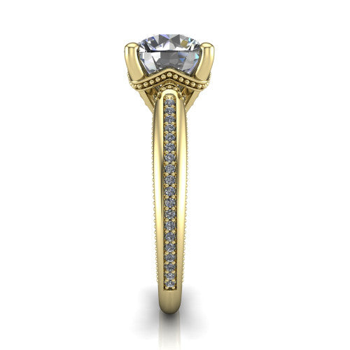 Vanessa round solitaire engagement ring in 18K Yellow Gold, side profile showing the pav&eacute; running down the band and the milgrain detailing in profile