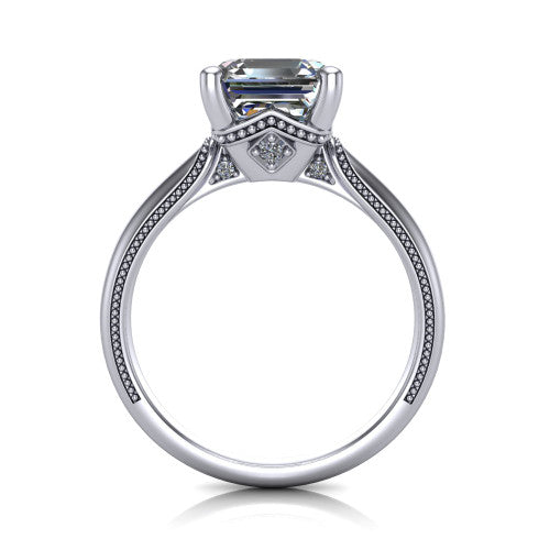 Vanessa square emerald solitaire engagement ring in Platinum, through-finger front profile showing the cathedral under-gallery with a diamond accent beneath the center