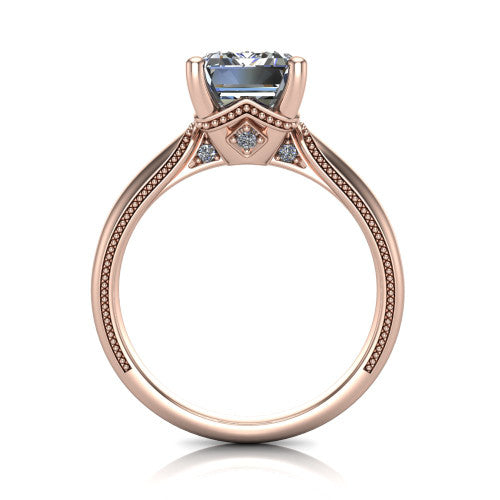 Vanessa emerald solitaire engagement ring in 18K Rose Gold, through-finger front profile showing the cathedral under-gallery with a diamond accent beneath the center