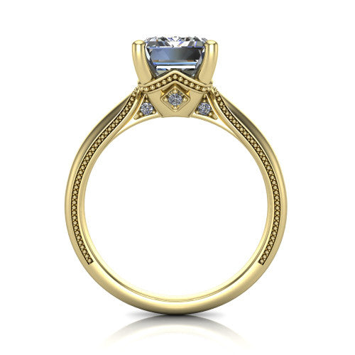 Vanessa emerald solitaire engagement ring in 14K Yellow Gold, through-finger front profile showing the cathedral under-gallery with a diamond accent beneath the center