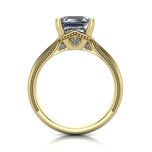 Vanessa square emerald solitaire engagement ring in 14K Yellow Gold, through-finger front profile showing the cathedral under-gallery with a diamond accent beneath the center
