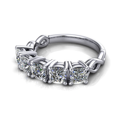 Aitana cushion three stone engagement ring in 14K White Gold, three-quarter perspective showing the round center between two round side stones in bar settings on a plain polished band