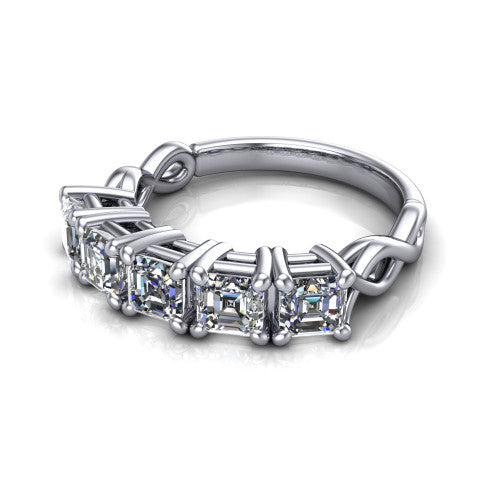 Aitana square emerald three stone engagement ring in Platinum, three-quarter perspective showing the round center between two round side stones in bar settings on a plain polished band