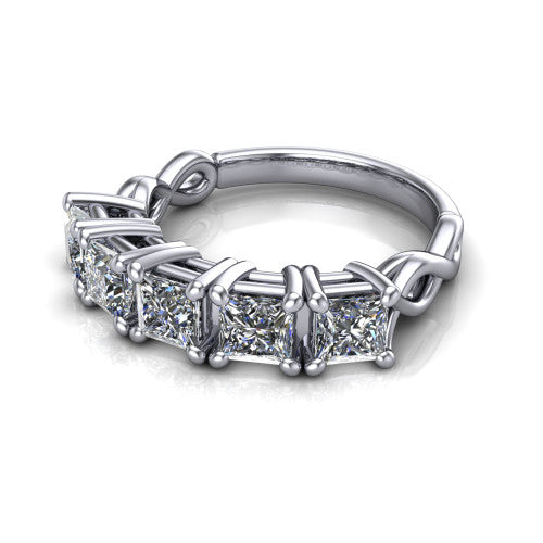 Aitana princess three stone engagement ring in Platinum, three-quarter perspective showing the round center between two round side stones in bar settings on a plain polished band