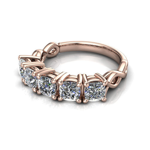 Aitana cushion three stone engagement ring in 14K Rose Gold, three-quarter perspective showing the round center between two round side stones in bar settings on a plain polished band