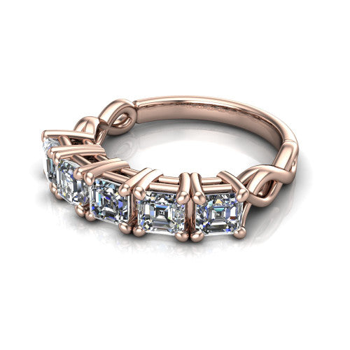 Aitana square emerald three stone engagement ring in 18K Rose Gold, three-quarter perspective showing the round center between two round side stones in bar settings on a plain polished band