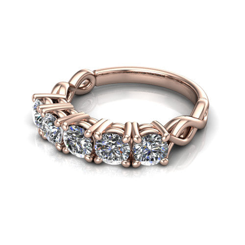 Aitana round three stone engagement ring in 14K Rose Gold, three-quarter perspective showing the round center between two round side stones in bar settings on a plain polished band