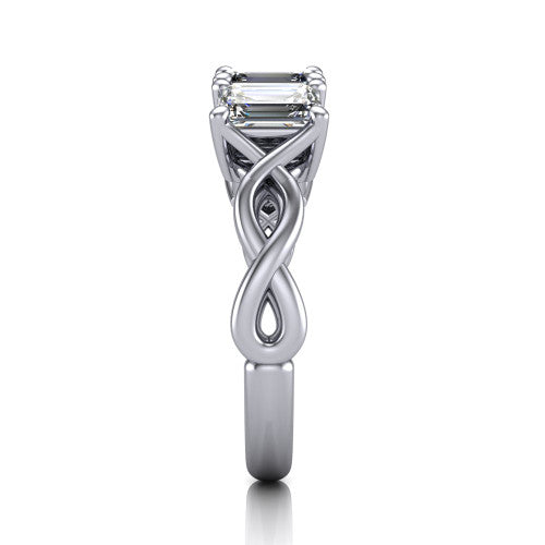 Aitana emerald three stone engagement ring in 18K White Gold, side profile showing the plain polished band and the bar-set side stones in profile