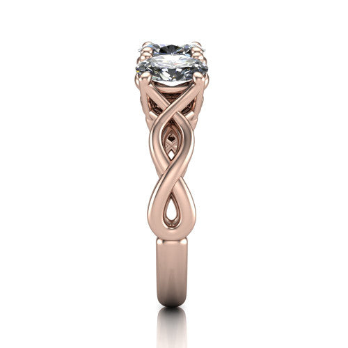 Aitana oval three stone engagement ring in 18K Rose Gold, side profile showing the plain polished band and the bar-set side stones in profile