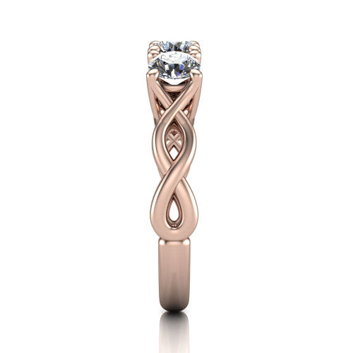 Aitana round three stone engagement ring in 18K Rose Gold, side profile showing the plain polished band and the bar-set side stones in profile