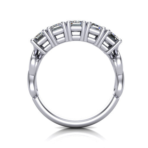 Aitana emerald three stone engagement ring in 18K White Gold, through-finger front profile showing the bar-set three-stone head raised above the smooth band
