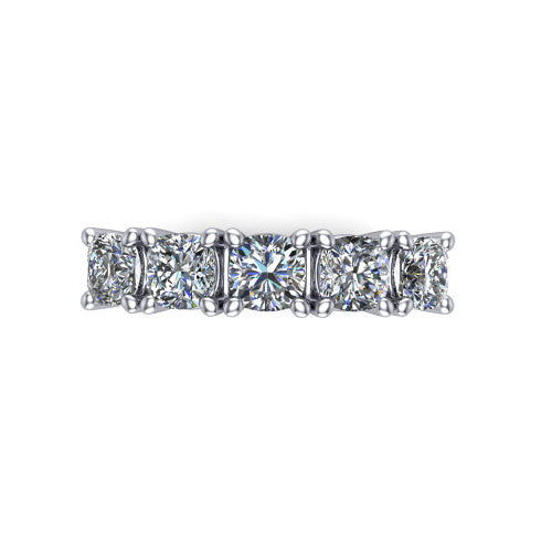 Aitana cushion three stone engagement ring in 18K White Gold, top-down view showing the three round diamonds held in vertical bar settings from above