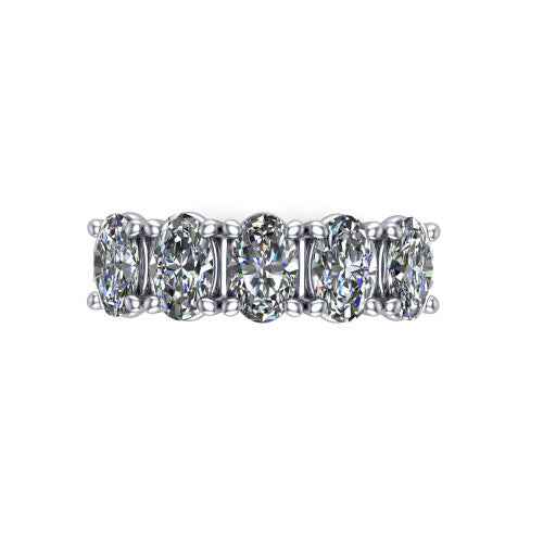 Aitana oval three stone engagement ring in 18K White Gold, top-down view showing the three round diamonds held in vertical bar settings from above