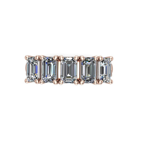 Aitana emerald three stone engagement ring in 18K Rose Gold, top-down view showing the three round diamonds held in vertical bar settings from above