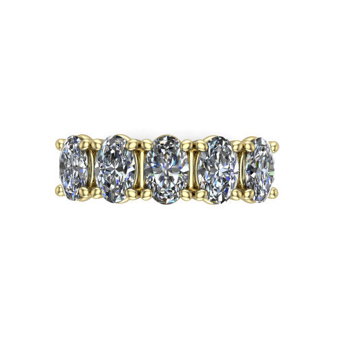Aitana oval three stone engagement ring in 18K Yellow Gold, top-down view showing the three round diamonds held in vertical bar settings from above