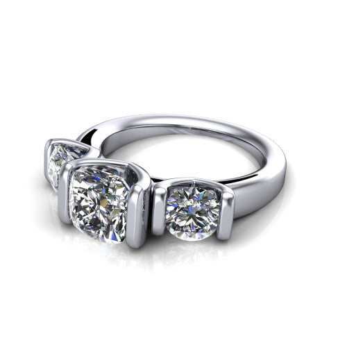 Elianna cushion three stone engagement ring in Platinum, three-quarter perspective showing the round center between two round side stones in bar settings on a plain polished band