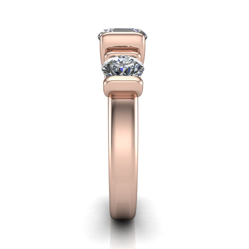 Elianna square emerald three stone engagement ring in 14K Rose Gold, side profile showing the plain polished band and the bar-set side stones in profile