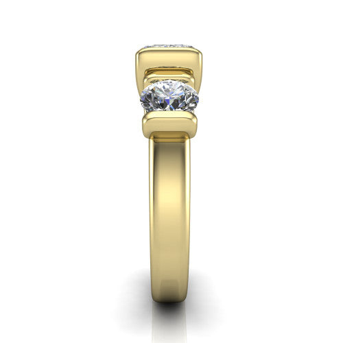 Elianna emerald three stone engagement ring in 14K Yellow Gold, side profile showing the plain polished band and the bar-set side stones in profile