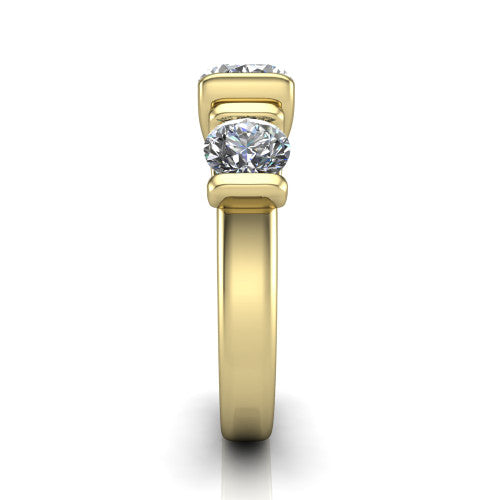 Elianna oval three stone engagement ring in 18K Yellow Gold, side profile showing the plain polished band and the bar-set side stones in profile